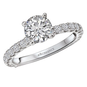 Diamond ring in 14kt white gold with a 14K peg head center. (D 1/2 carat total weight) This item is a SEMI-MOUNT and it comes with NO CENTER STONE as shown but it will accommodate a 6.5mm round center stone. Peg Head