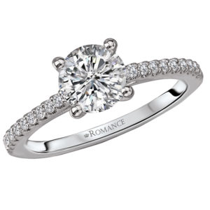 Classic Diamond Ring in 14kt White Gold with a Fancy Peg Head (D 1/7 carat total weight) This item is a SEMI-MOUNT and it comes with NO CENTER STONE as shown but it will accommodate a 6.5mm round center stone.