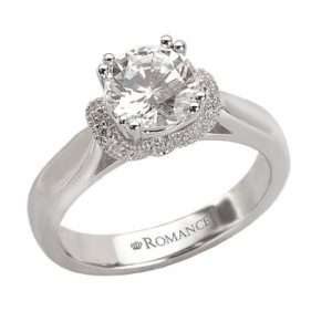 V Trellis Diamond Ring in 18kt White Gold. (D.1/8 carat total weight) This item is a SEMI-MOUNT and it comes with NO CENTER STONE as shown but it will accommodate a 6.5mm round center stone. Peg Head