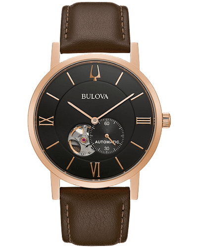 Bulova American Clipper Rose gold-tone stainless steel case with open aperture black dial with exhibition case back offering a glimpse of the 21-jewel automatic heartbeat movement with a 42-hour power reserve. Dial features rose gold-tone hands and markers and a sub sweep dial. Brown leather strap. Flat mineral crystal. Water resistance to 30 meters.