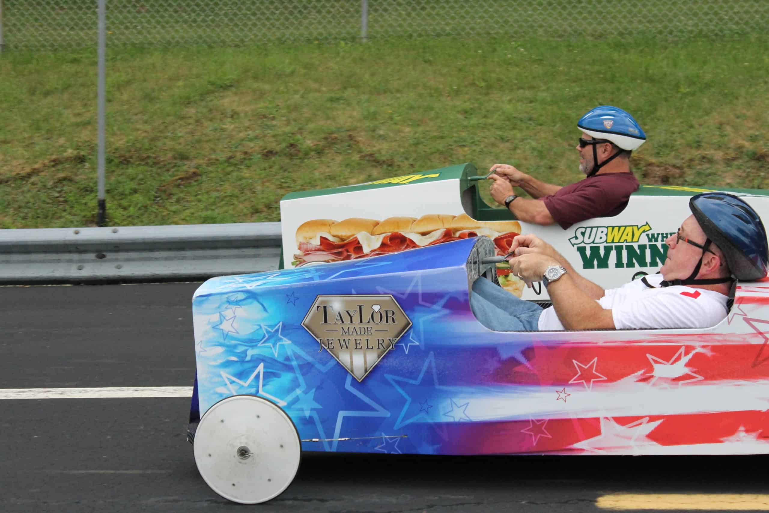 Jim driving Taylor Made soapbox derby car