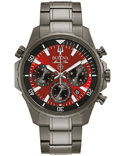 Bulova Marine Star Six-hand chronograph function with calendar, gray IP stainless steel case with rotating dial ring to measure elapsed time, and a bold red dial with luminous hands and markers. Flat mineral crystal, screw-back case, gray IP stainless steel bracelet with fold over buckle closure, safety bar and extender, and water resistance to 100 meters.