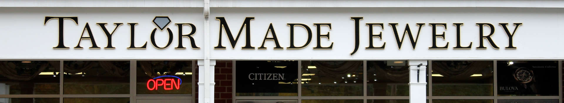 Taylor Made store front sign