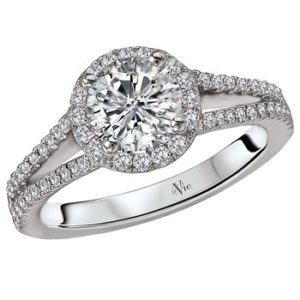 Split Shank Diamond Ring with a Round Halo in 14kt White Gold. (D 1/3 carat total weight) This item is a SEMI-MOUNT and it comes with NO CENTER STONE as shown but it will accommodate a 6.5mm round center stone.