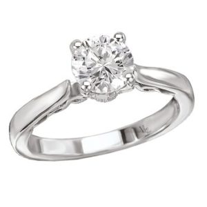 Solitaire Diamond Ring in 14kt White Gold. ( D .03 carat total weight) This item is a SEMI-MOUNT and it comes with NO CENTER STONE as shown but it will accommodate a 6.5mm round center stone.