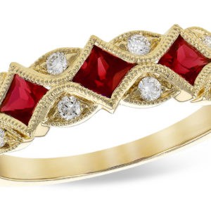 Ruby and diamond milgrain leaf look 14kty band looks like set on point. The Ruby is .55ctw and the total weight of the stones is .70ct
