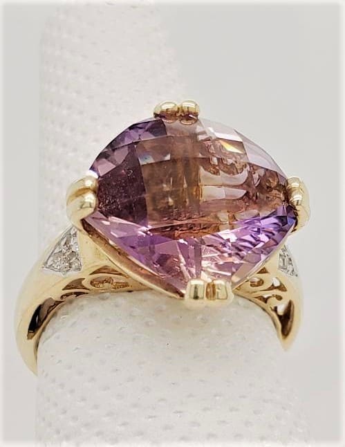 Ametrine Ring with .03ctw in Diamonds.*This item is clearance and is sold as is. This item is being sold in store as well as on the website. Availability is subject to change. Items from clearance cannot be refunded and are exchange only.