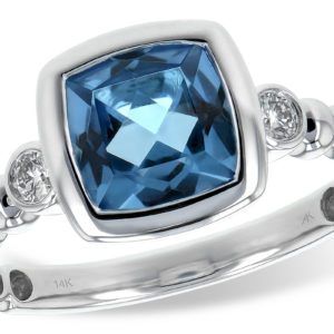 1.57ct Blue Topaz with bead shoulders and diamond bezel set on each side set in 14kwg